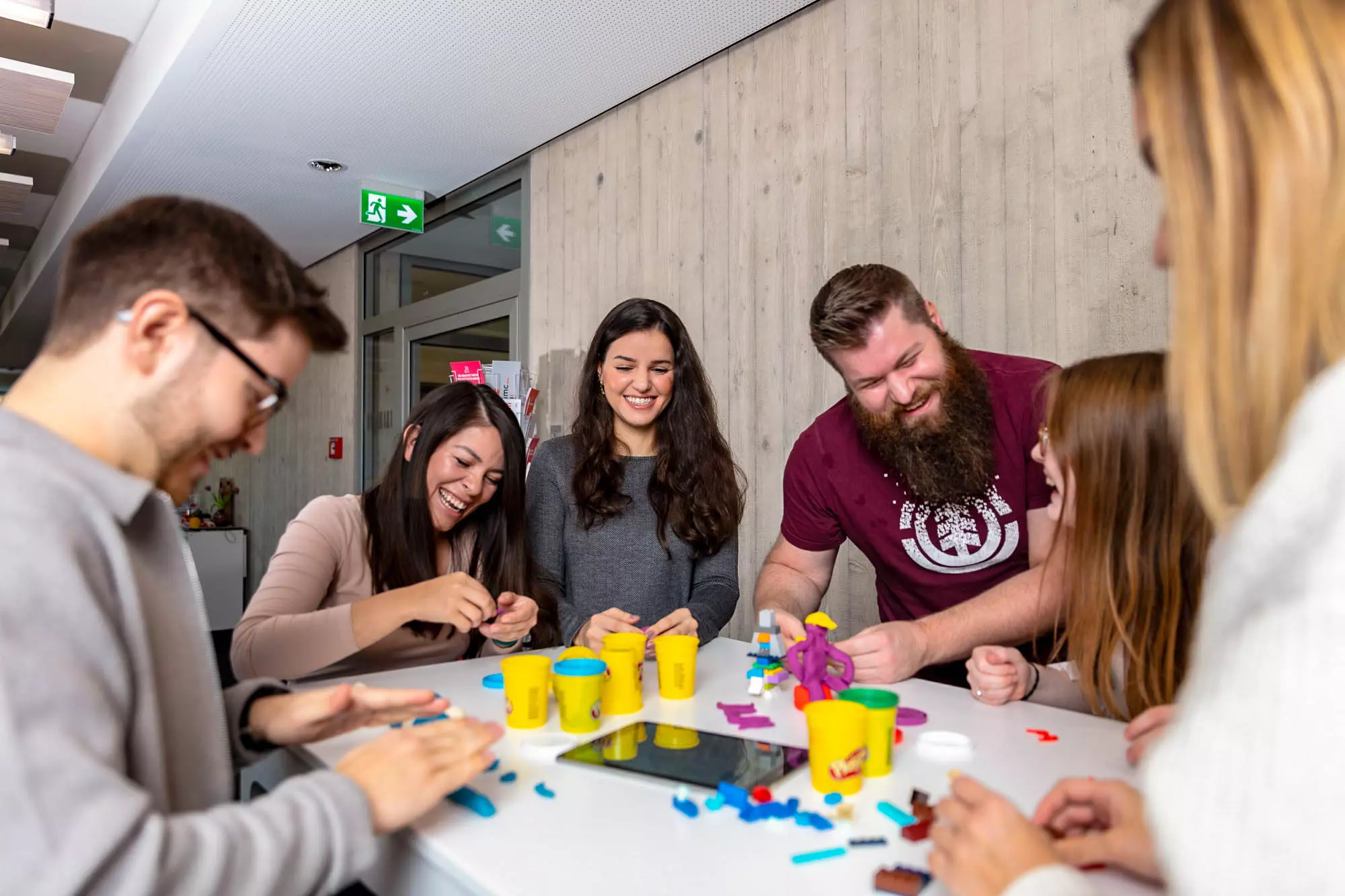 imc employees at play with playdough