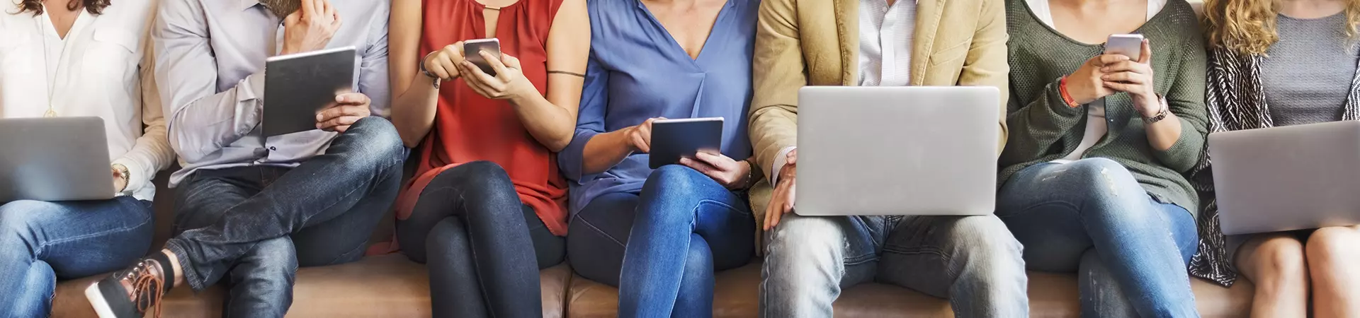 lineup of people on devices