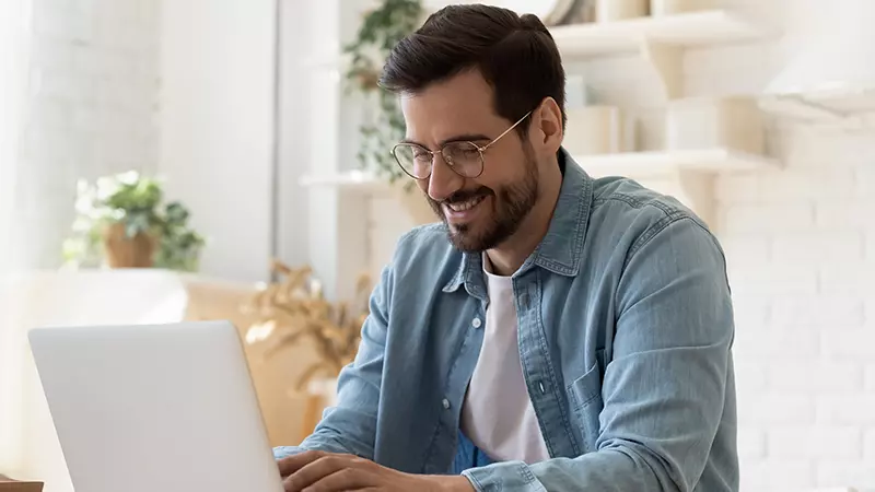 man working at computer