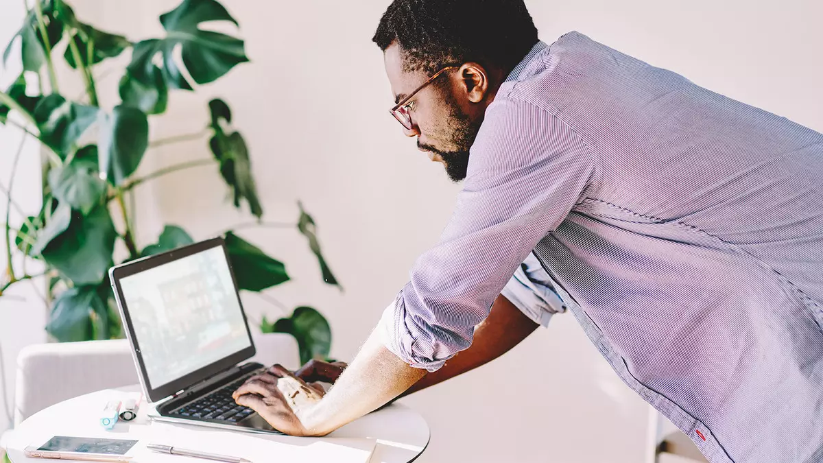 Job Slot, person working on Laptop