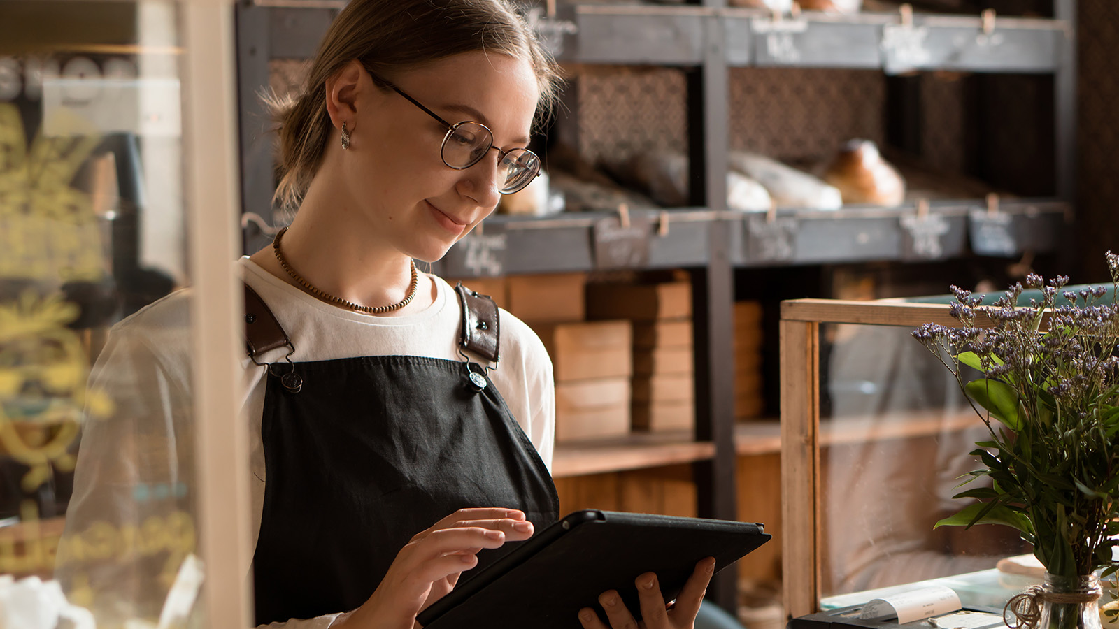 retail worker using digital tablet