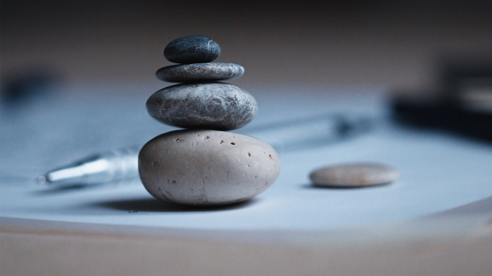 stack of stones on a work desk